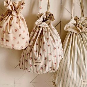 Sezane - set of Three Cotton Travel Bags in Florals and Stripes